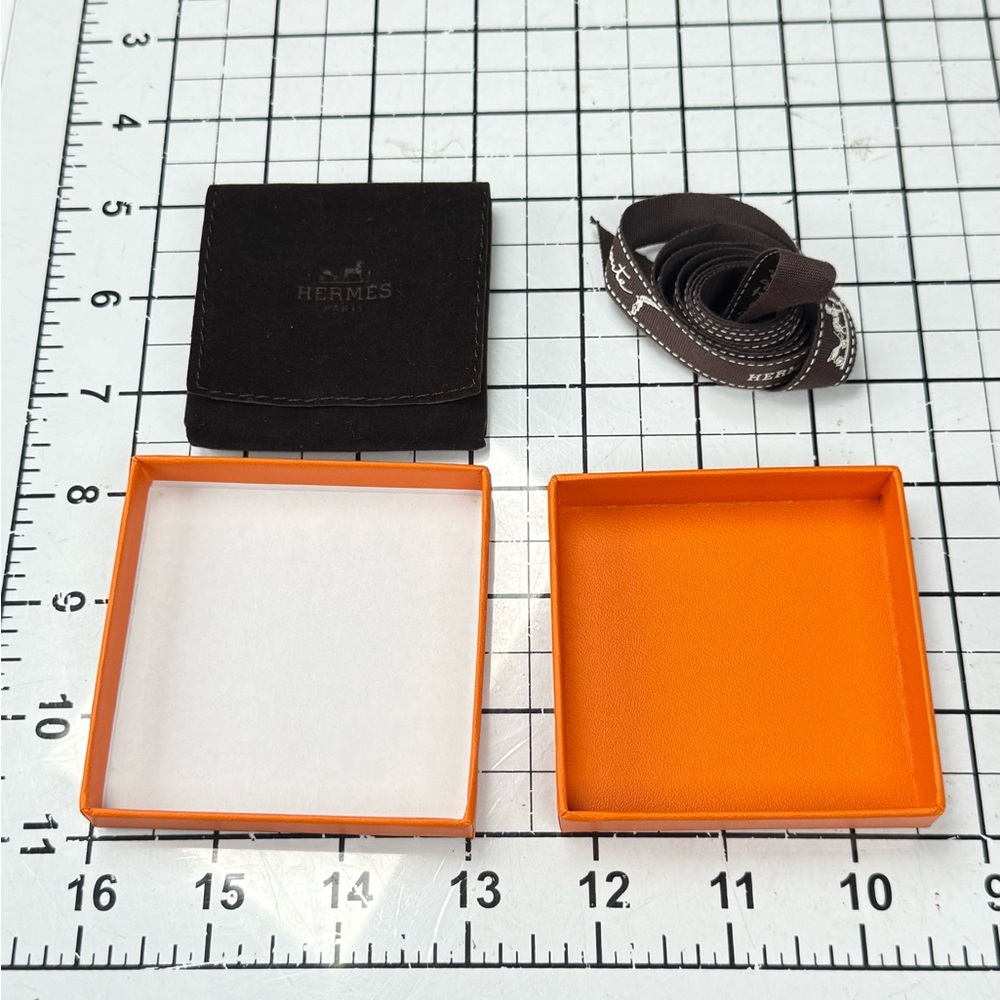Hermes Orange and Black Storage Box. 3 by 3 inches, ribbon, brown pouch. - Picture 7 of 7